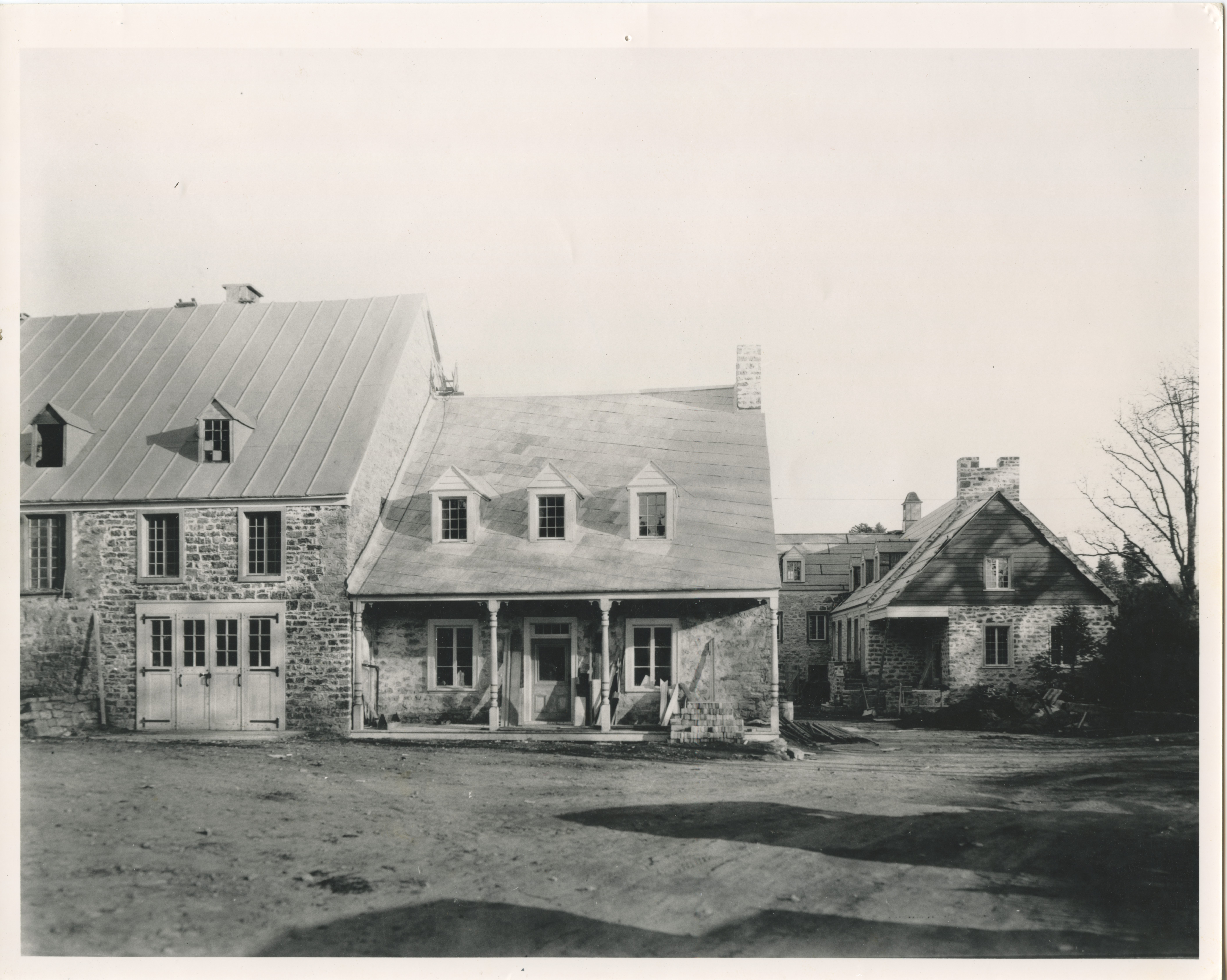 Le moulin et la maison du meunier vers 1931, après les rénovations de l’architecte Ernest Isbell Barott. Source : Studio Rice. Collection Jean-Claude Coutu/Fonds Gilles Chartrand.